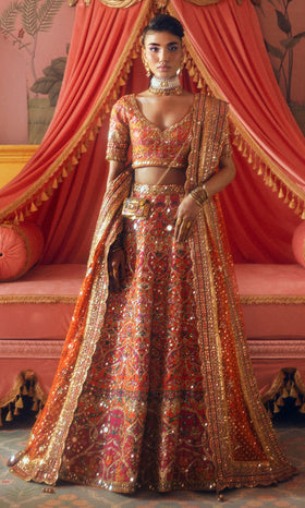 Indian Bridal Dress in Orange Lehenga and Choli Style